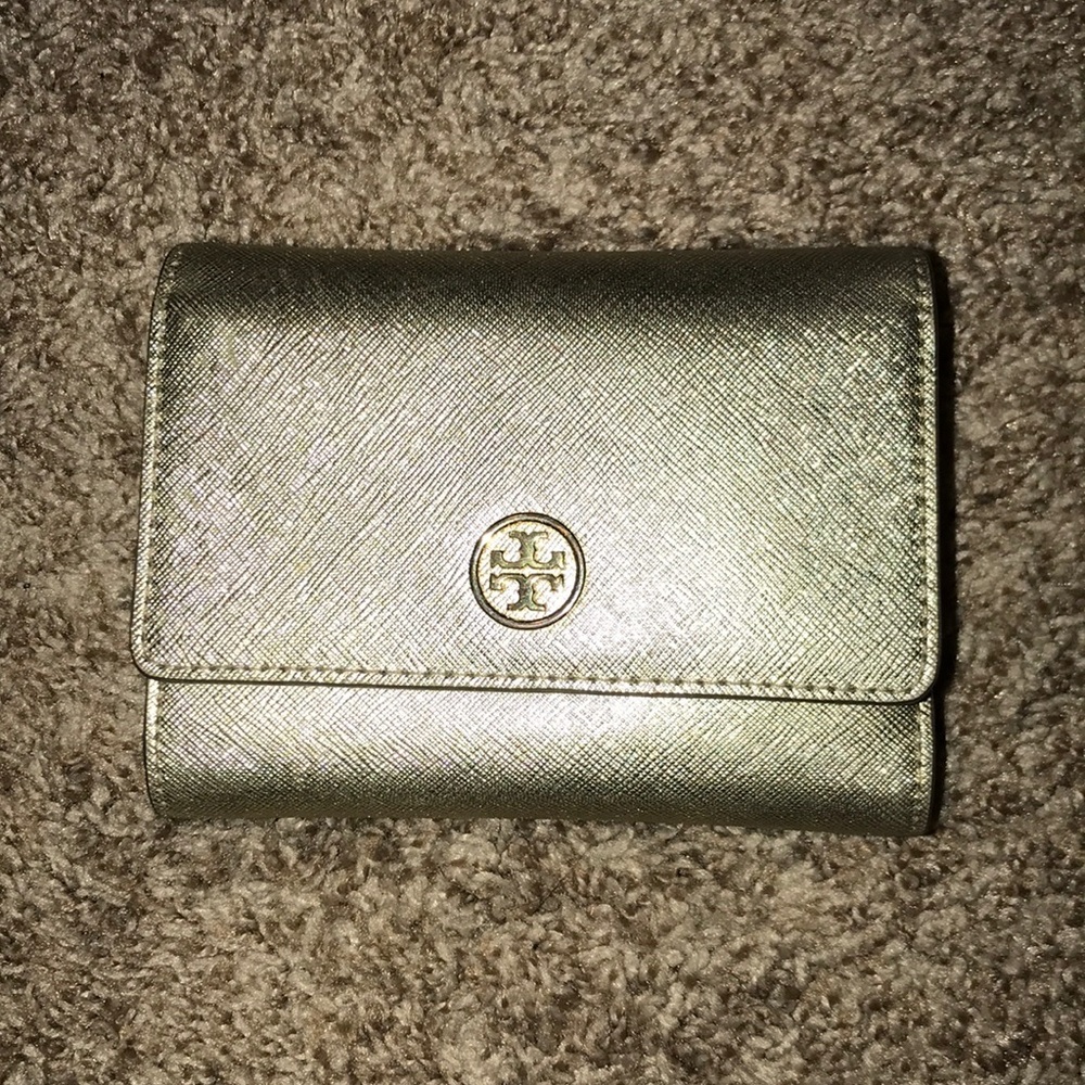 Gold Tory Burch tri-fold wallet
